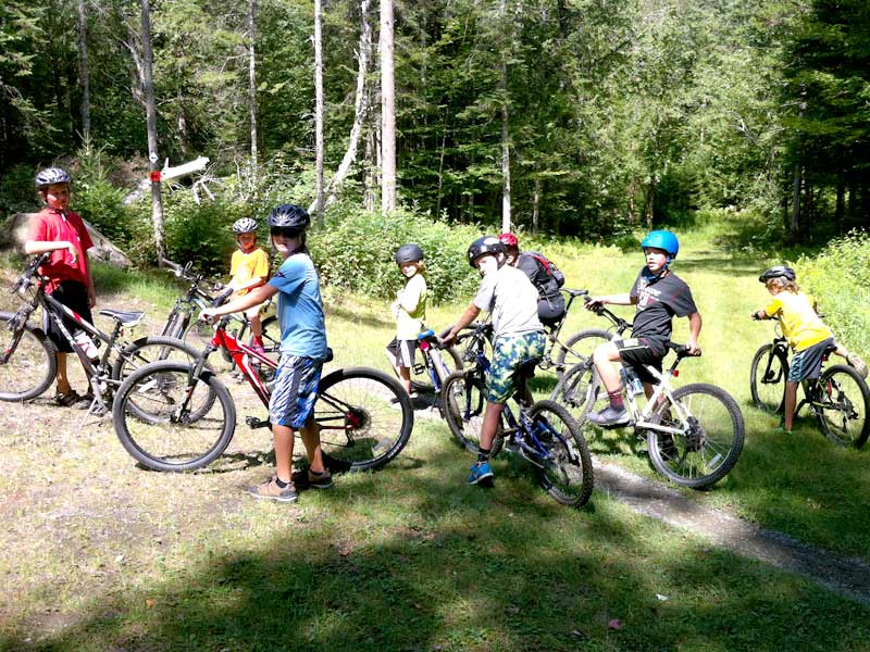 After taking a dip, we hop right back on our bikes to continue adventuring. Mud city offers all sorts of fun adventures for families and kids. Custom tours of the Stowe Vermont area too.