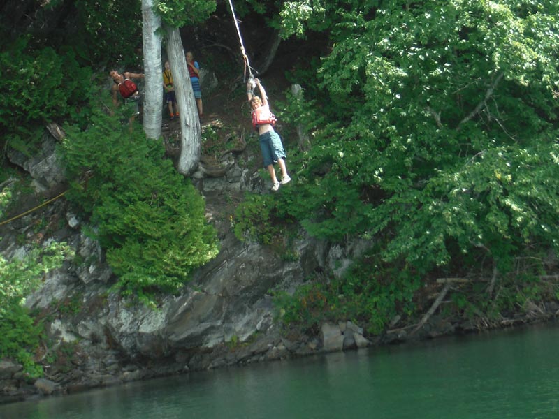 Kowabunga dude! Here's a camper launching off of one of our favorite rope swing spots deep in the country of Vermont. We have a few spots we like to jump from on our canoe adventures during our Vermont Adventure, join us!