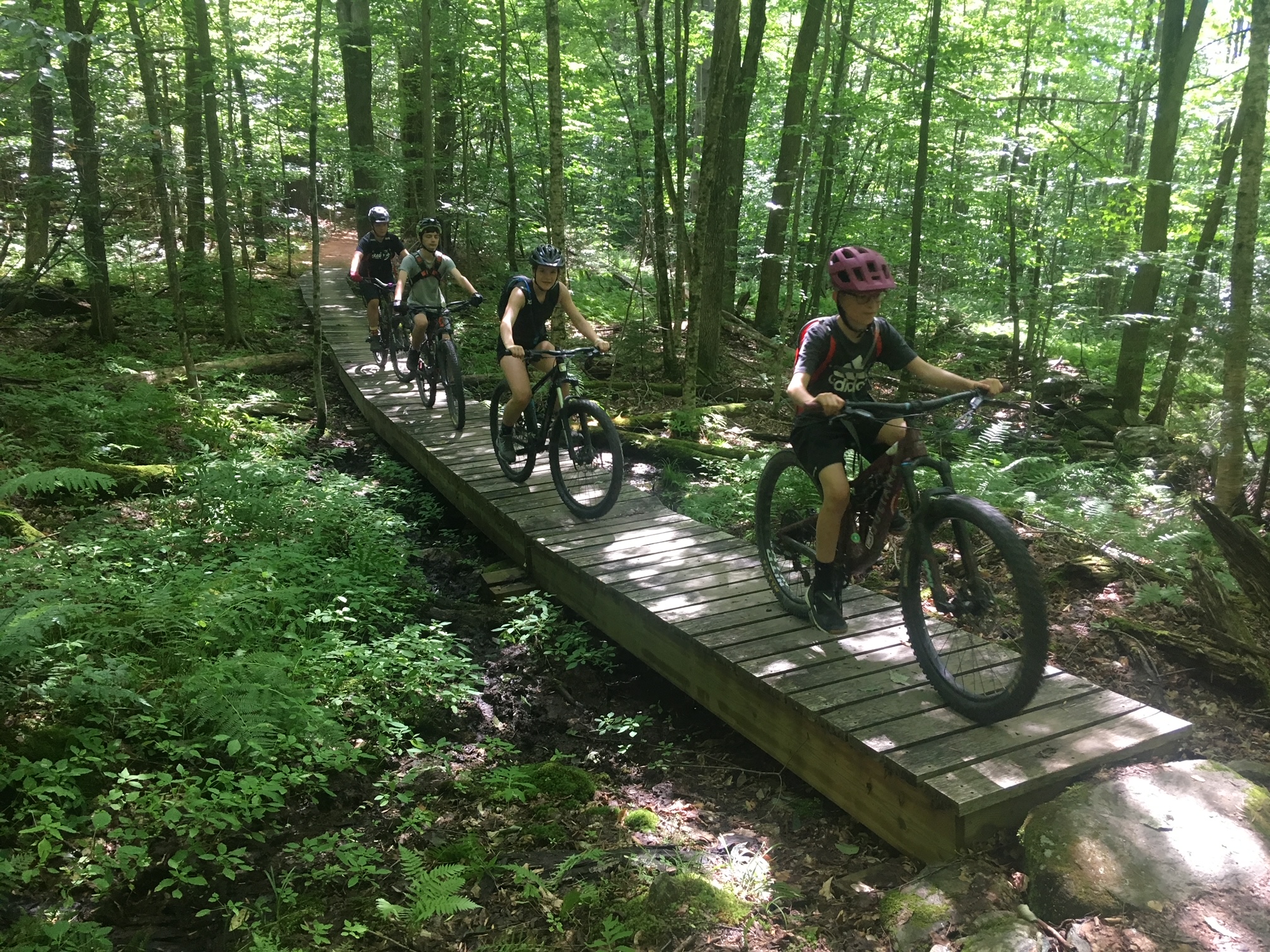 The Mud City gang charges through the woods! Here's a picture of the kids riding through the woods at Trapp Family Lodge.